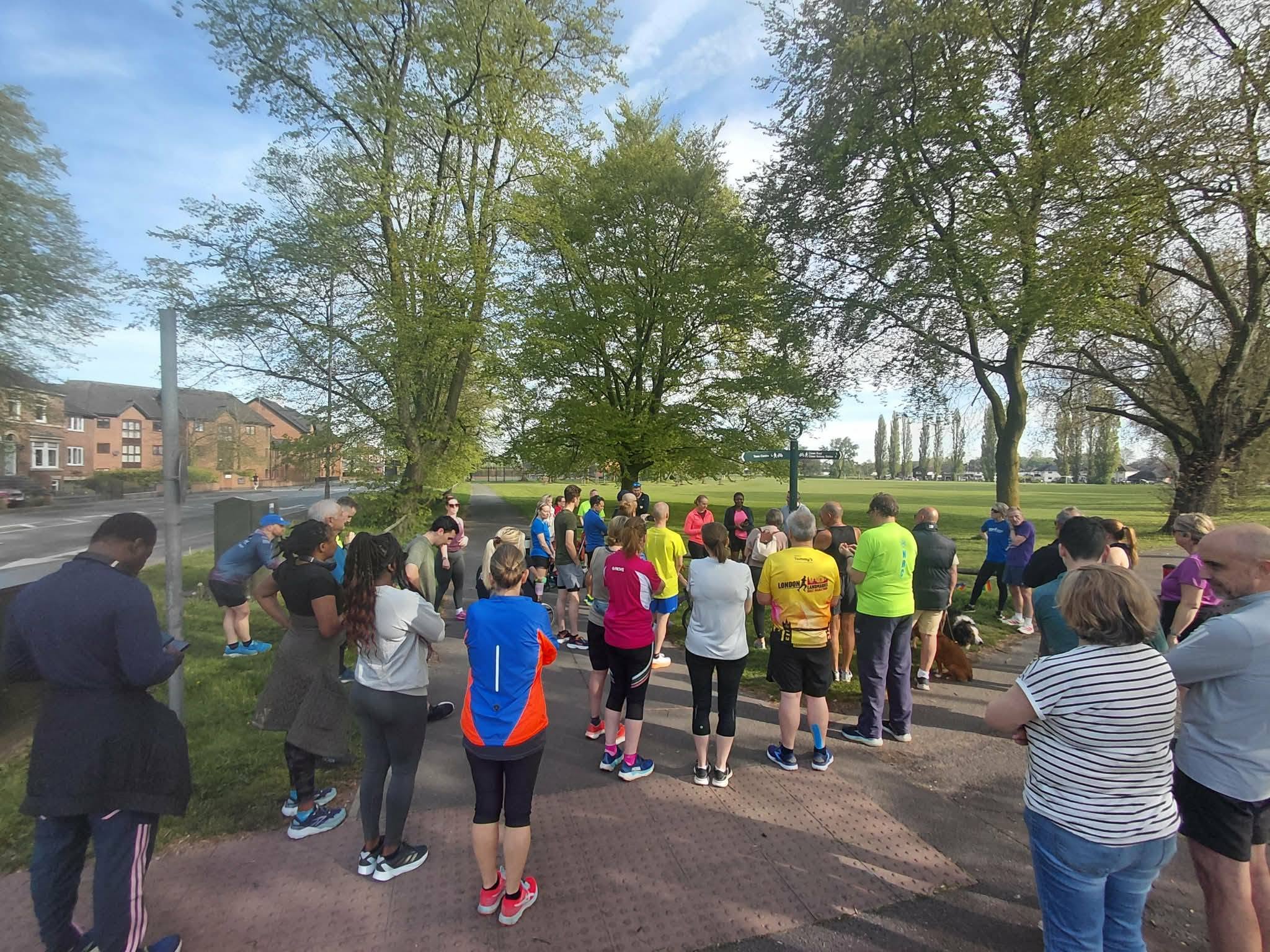 Participants gather in a park at a limb difference themed Dash