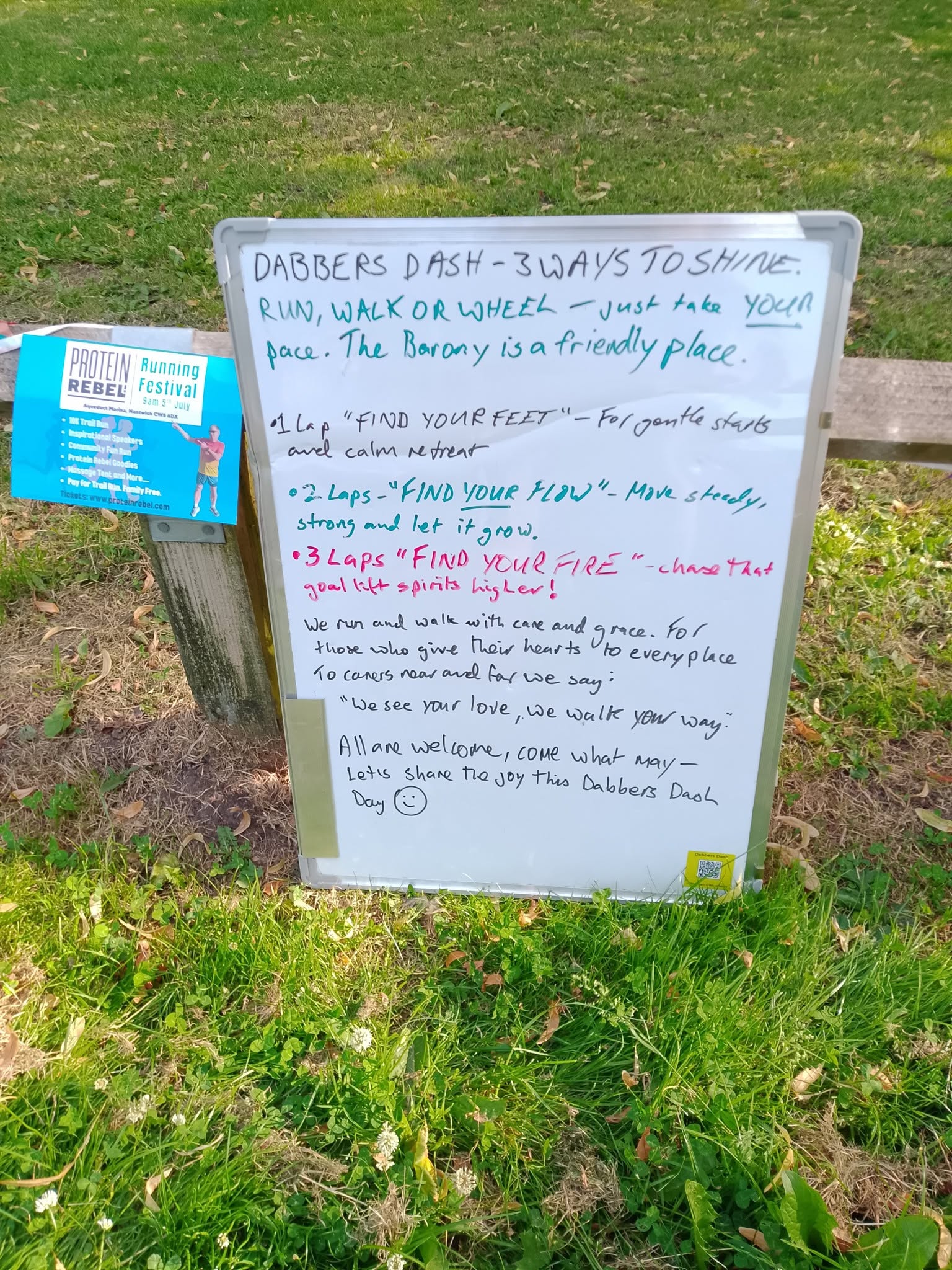 A handwritten Dabbers Dash board showing one, two and three lap options, with walking, running or wheeling at your own pace